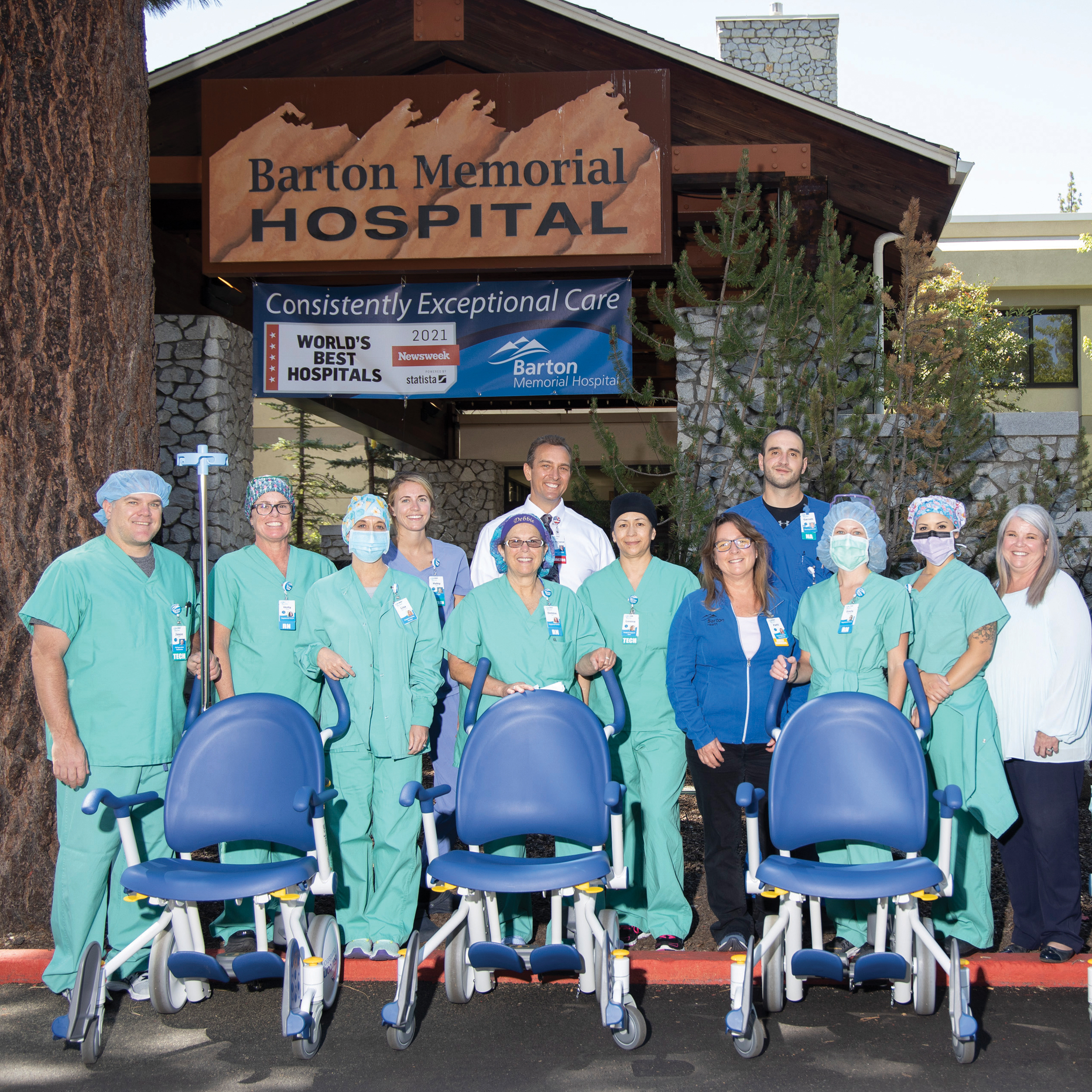 Group photo of the Barton Health Foundation team standing behind the new donated wheelchairs
