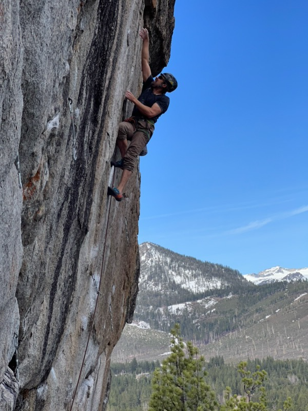 Dr. Habicht climbs a mountainside.